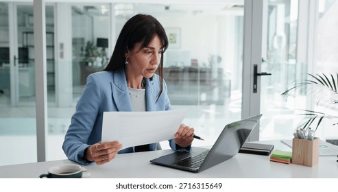 Person reviewing personal loan options on laptop